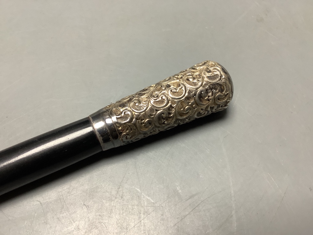 A George V silver mounted ebonised conductors baton in case, 45.3 cm.